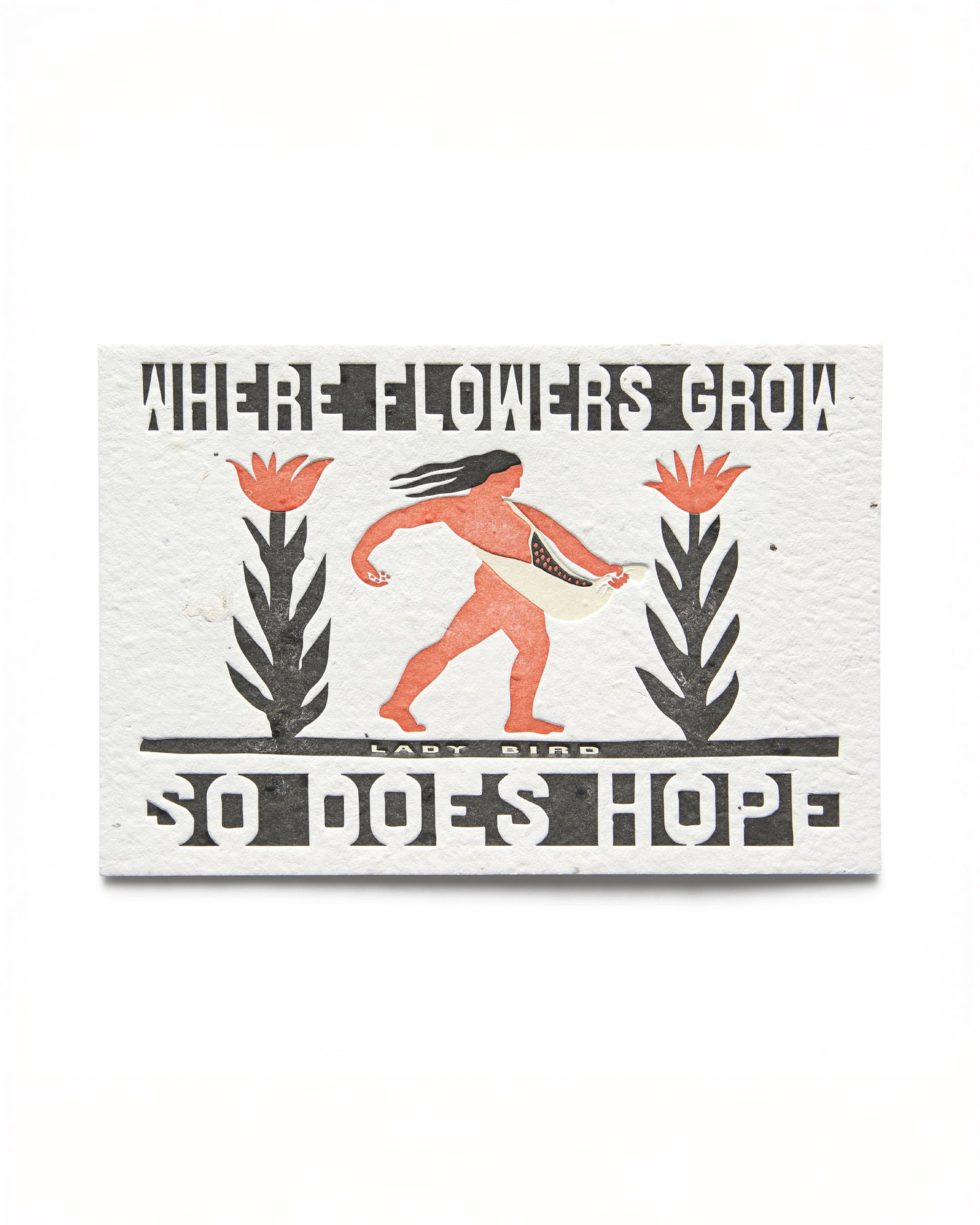 A postcard with letterpress text and illustration, featuring a figure sowing seeds among flowers, with the text 'WHERE FLOWERS GROW SO DOES HOPE - LADY BIRD'.